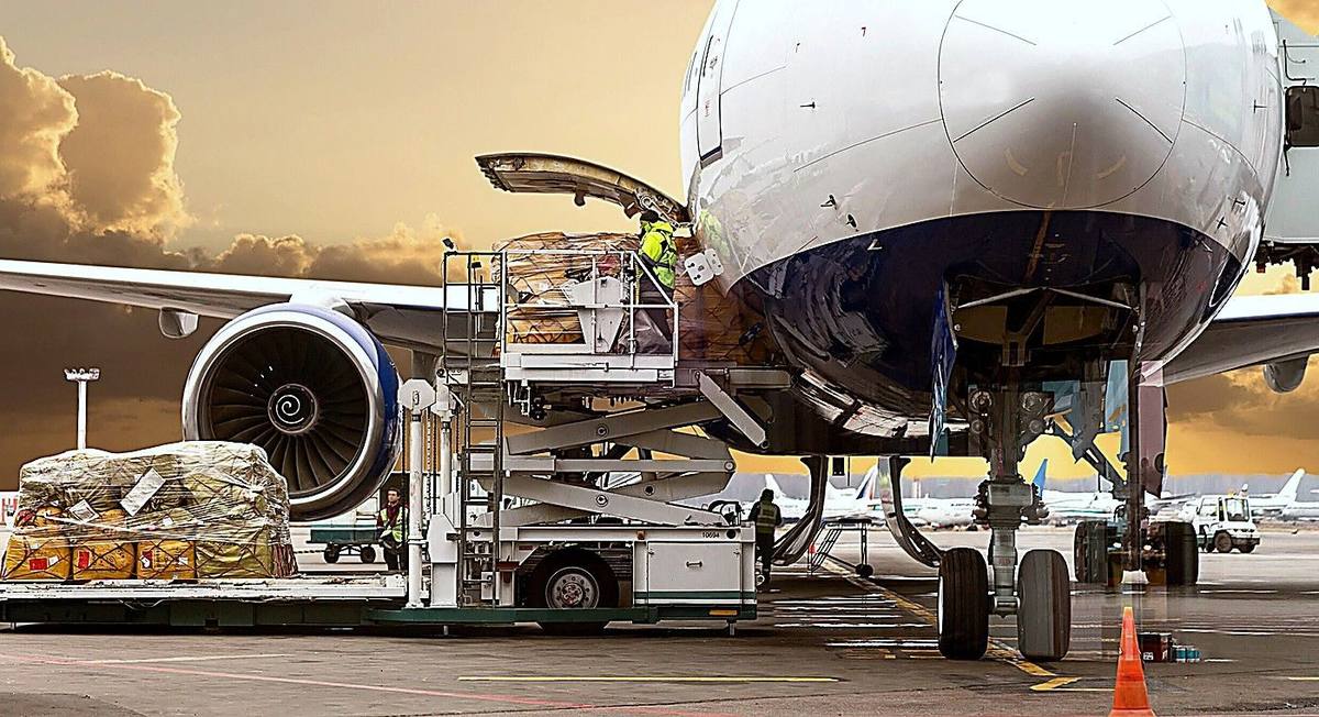 Air freight forwarding Dubai — cargo aircraft loading at airport for international shipments